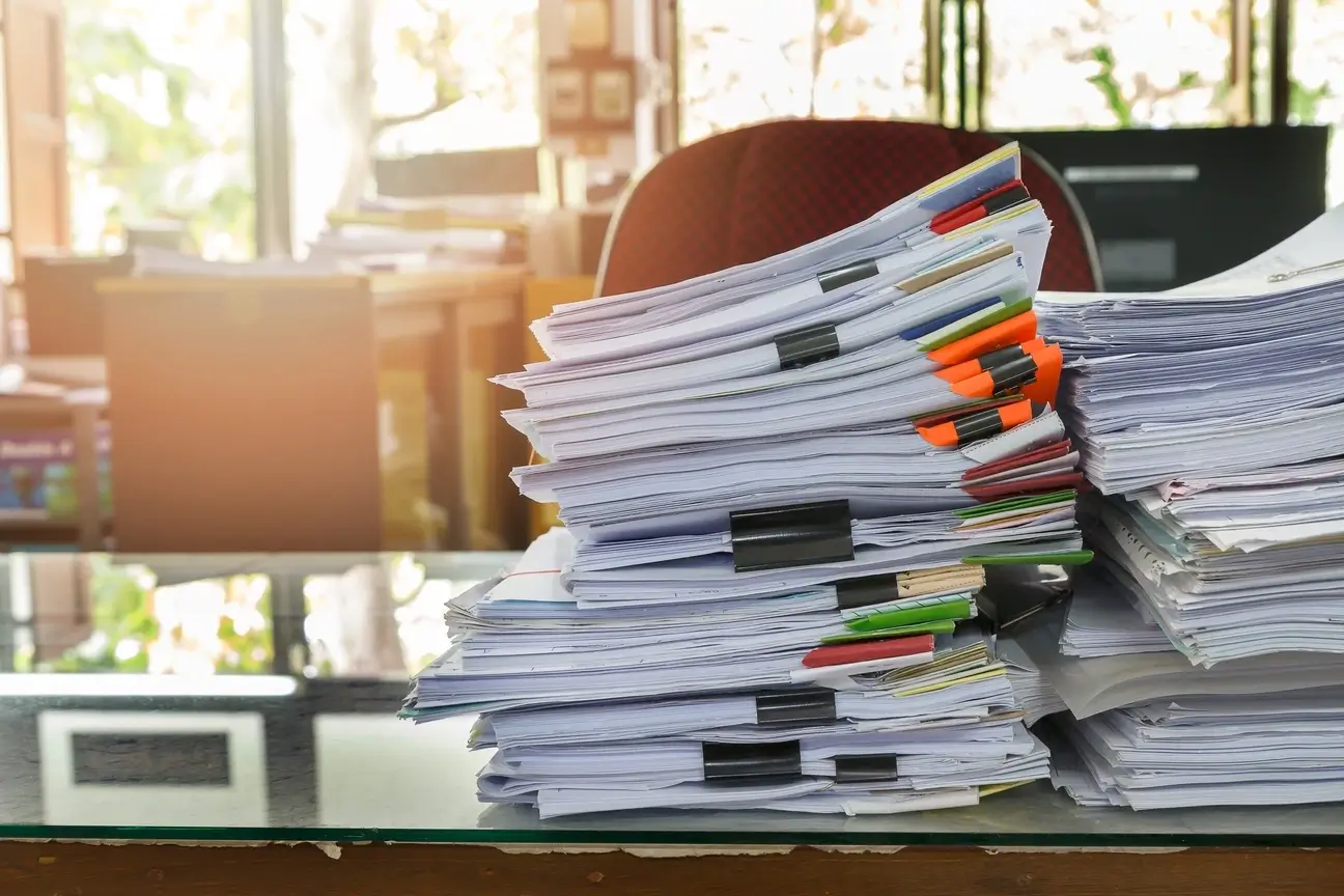 Stacks of paperwork and legal research material